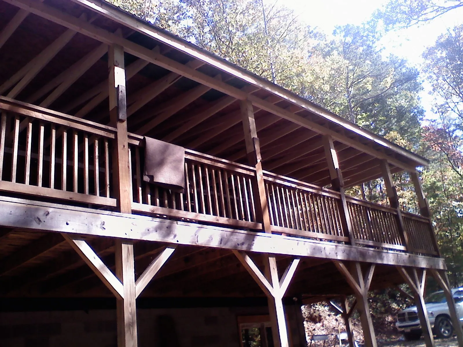 Timber framing under a new elevated porch and deck — Roof Leak Repair in Pacific Palisades by Roofing Brothers